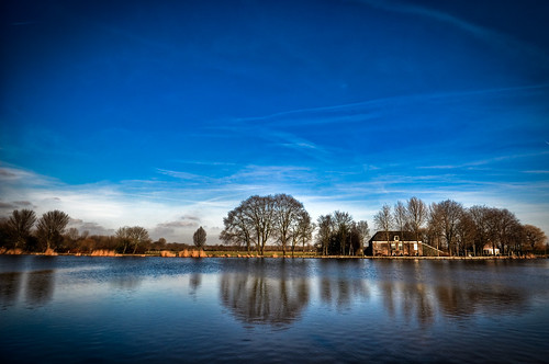 blue winter sky cold tree water amsterdam clouds reflections river landscape skies thenetherlands clear temperature 1020mm amstel amstelveen celcius abigfave impressedbeauty goldstaraward