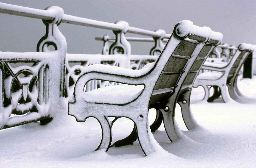Snow Covered Bench on Hove Promenade.