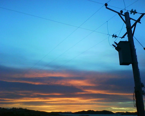 blue orange clouds sunrise lewis hills wires electricity telegraphpole hebrides morningsky crossbost
