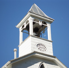 Moon visible through bell tower at Trinity UMC, Catlett, VA