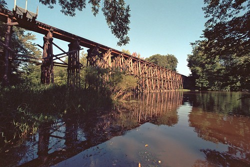 railroad trestle bridge reflection water river dam nikonf5 printfilm colorneg vuescan nikoncoolscan5000ed kodakektar100 nikkor15mmf56aiultrawideangle