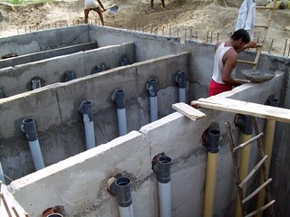 Construction work at a sewage treatment plant in one of the projects villages.