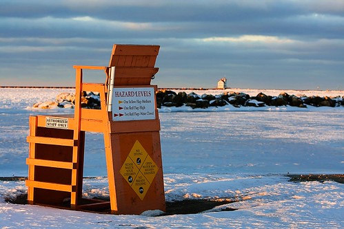 winter sunset sun lake snow signs beach sign warning lakeerie lifeguard greatlakes lakeview goldenhour brr lifeguardchair lorain beachchair lorainlighthouse lorainohio