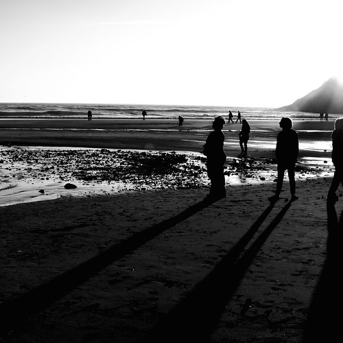 ocean light sunset people bw sun beach water oregon contrast canon square coast sand shadows 50d anawesomeshot