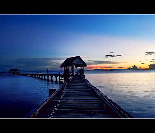 sunset red sea sky orange sun water yellow pier nikon asia southeastasia philippines bluesky bluehour reflectioninwater nalusuanisland d3000 colorsinwater endlesspier pnike