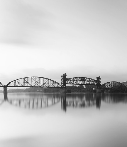 city railroad morning bridge summer bw white motion black abandoned water monochrome rock metal clouds sunrise canon river lens island eos early interesting long exposure downtown little august explore hero winner after motor arkansas usm obscured 2009 ef 1740mm ultrasonic bigmomma f4l andeverything 40d challengeyouwinner thechallengefactory herowinner byclouds img0148v2c1 2009summerphotoextravaganzaspectucularandfishfrychilicookoff claytonwells