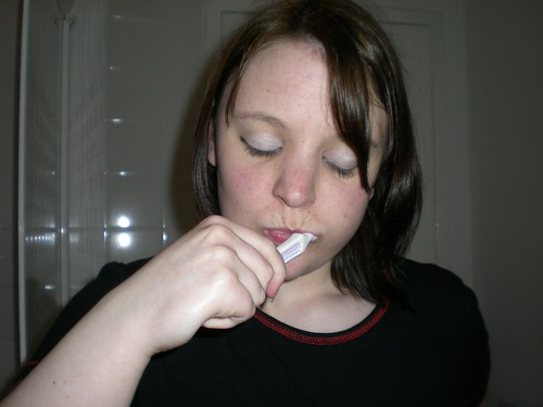 brushing teeth in the dark before sleeping