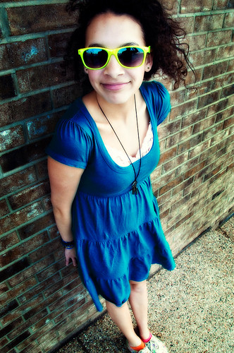 blue portrait sun brick girl smile sunglasses yellow wall lens glasses nikon dress d 200 mm nikkor 18 90 2009 vr 18200mm d90 f3556g nikor