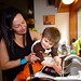 grandma helps a grandson wash his hands in the kitchen sink    MG 2593