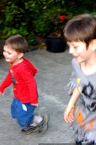 brothers running wild in the street after dinner    MG 3915