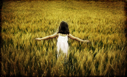girl field back open arms little wheat daughter theghostofaflea