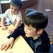 nick applies for his first library card as his little brother looks on   DSC02908