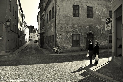 street city morning houses light shadow two sun bicycle contrast buildings germany easter deutschland town blackwhite spring women border saturday poland sunny spot goerlitz sachsen april intersection oldtown schatten canoneos400d andreeagerendy gettyimagesgermanyq1