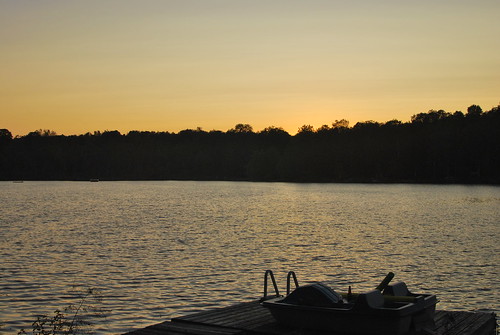 sunset summer lake boat dock cottage serene