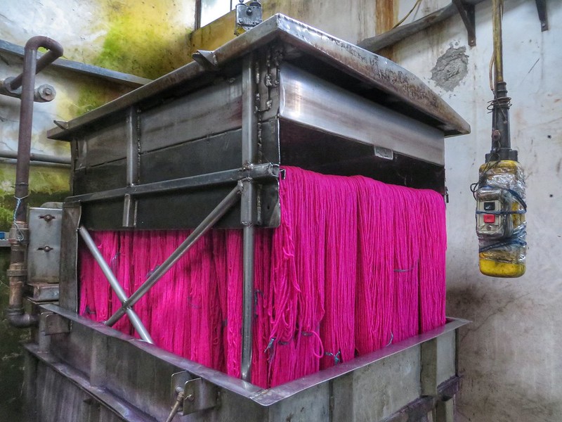 Bright pink wool at the yarn factory in Salinas de Guaranda, Ecuador