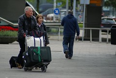 Reizigers met hun baggage