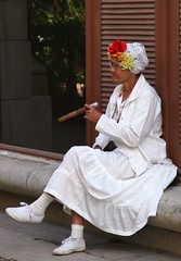 Cuban woman waiting to be photographed