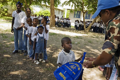 MINUSTAH Peacekeepers Distribute School Supplies to Children