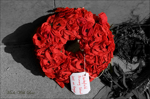 red geotagged australia victoria wreath tribute paperflowers selectivecolour poppys mountmacedon madewithlove nikond300 teelawn anzacday2010 clarkefieldprimaryschool ©tinabarker
