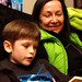 nick reading a bedtime story to his brother and his grandmother    MG 2991