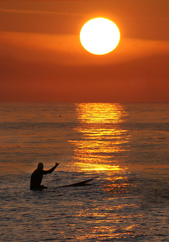ocean morning orange santacruz water silhouette yellow surf glow photographer michellekiba sunsunrise canon50d californiaphotographer earlywave 50duser canon50dcanonphotography