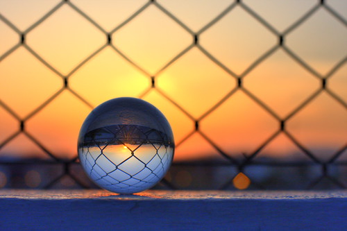 blue light sunset orange black canon fence published dof bokeh religion science athens depthoffield sphere refraction 365 hdr crystalball canonef50mmf14usm laplace marousi αθήνα canoneos40d opticalglass μαρούσι αττικήοδόσ toomanytribbles κηφισιασ jerrycoyne