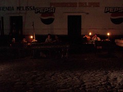 Market at night with candles - Mercado de noche con velas; Rabinal, Baja Verapaz, Guatemala