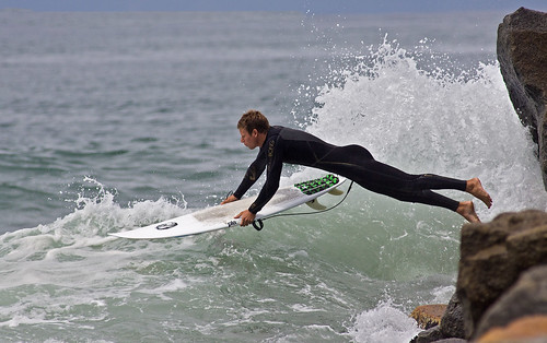 ocean california county summer water sport rock canon fun photo cool dangerous jump san surf waves action surfer extreme wave diego surfing spray dude 300mm southern photograph oceanside surfboard soe entry wetsuit splashdown 14x f4l 300mmf4l 50d canon50d explorer211 familygetty