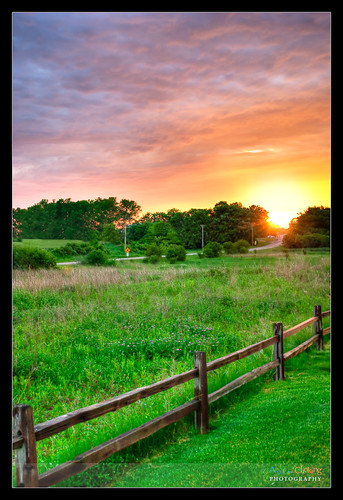 trees sunset orange storm green home grass fence illinois interestingness spring explore forestpreserve lakewood hdr lakecounty trailside wauconda explored millenniumtrail lcpfd