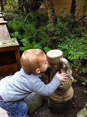 Aiden kissing a garden gnome