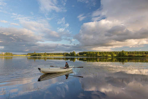 lake clouds reflections finland boat calm rowing scandinavia lakeland rowingboat