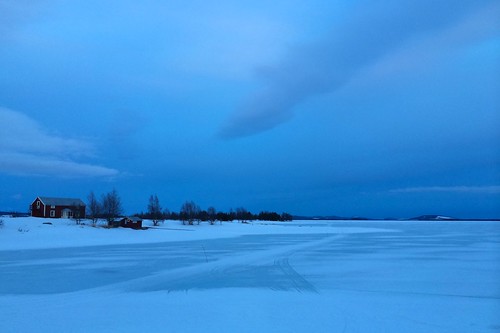 lake snow ice clouds sweden brännholmen
