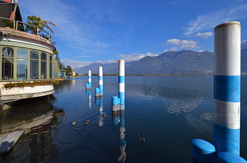 blue wallpaper italy lake reflection water lago italia day background bluesky clear lombardia lombardy lagodiseo lovere mooringposts pwpartlycloudy