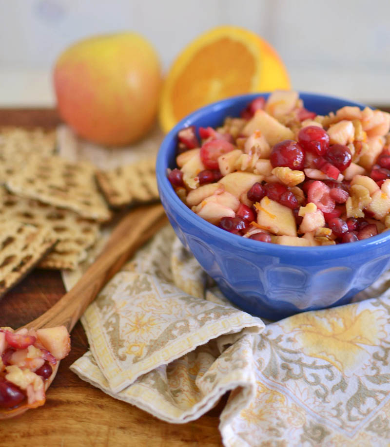 Apple and cranberry Passover charoset is tart and fruity, mixed with pomegranate seeds and a touch of honey for sweetness.