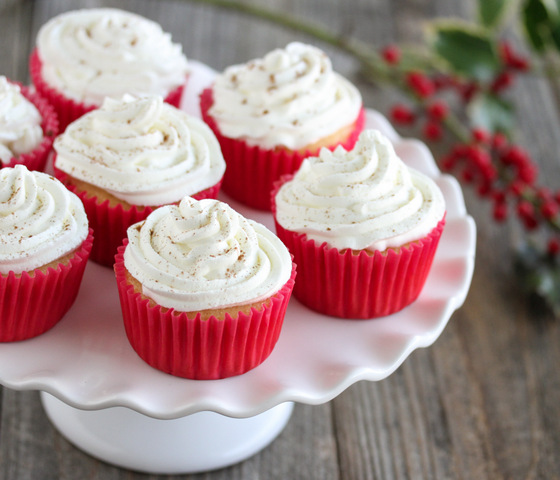 photo of eggnog cupcakes on a white cake platter