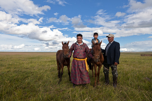travel family portrait horses grass clouds landscape adventure mongolia steppe dornod
