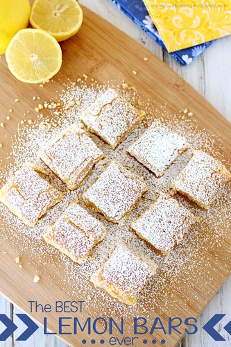 The best LEMON BARS ever - with their buttery crust and yummy lemony filling, they're sure to become a family favorite!  #lemon #Spring #dessert