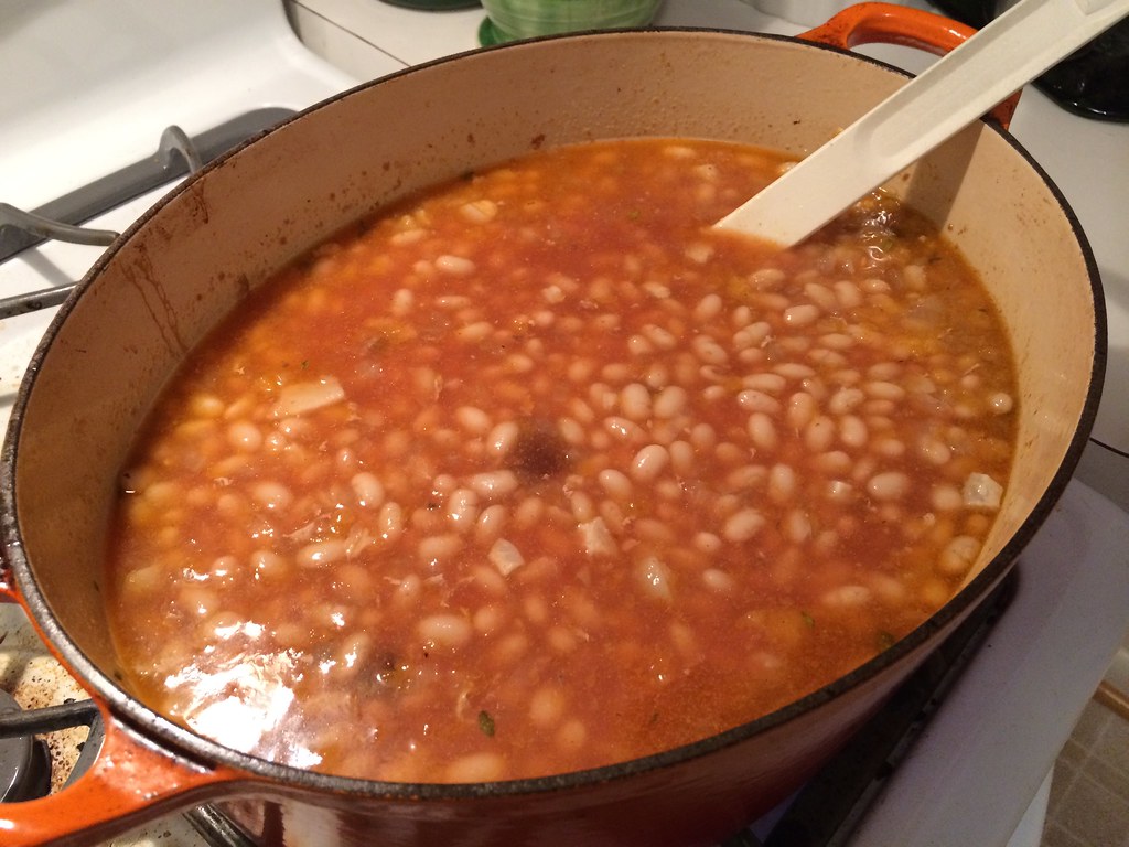 beans re-cooking in the lamb stew liquid