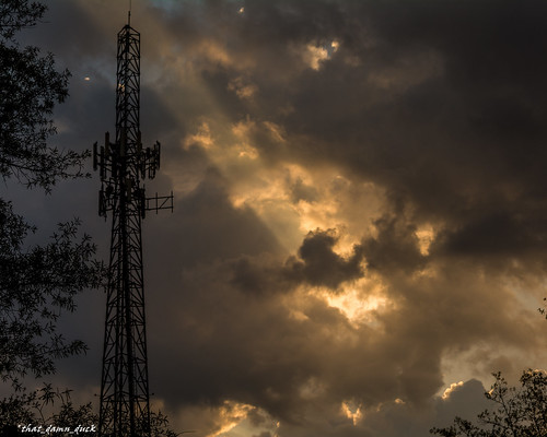 sunset sundown clouds sunrays nature dusk tower