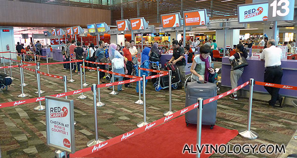 Dedicated Red Carpet check-in counter with a real red carpet 