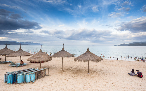 sea sky people beach water clouds umbrella deckchair vietnam 1740mm nhatrang 2013 canon5dmarkiii