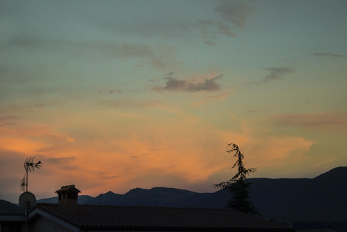 blue sky orange mountains green sunrise cloudy