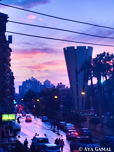 street city light sunset people sun rain egypt iphone insta mansoura elmansoura uploaded:by=flickrmobile flickriosapp:filter=nofilter