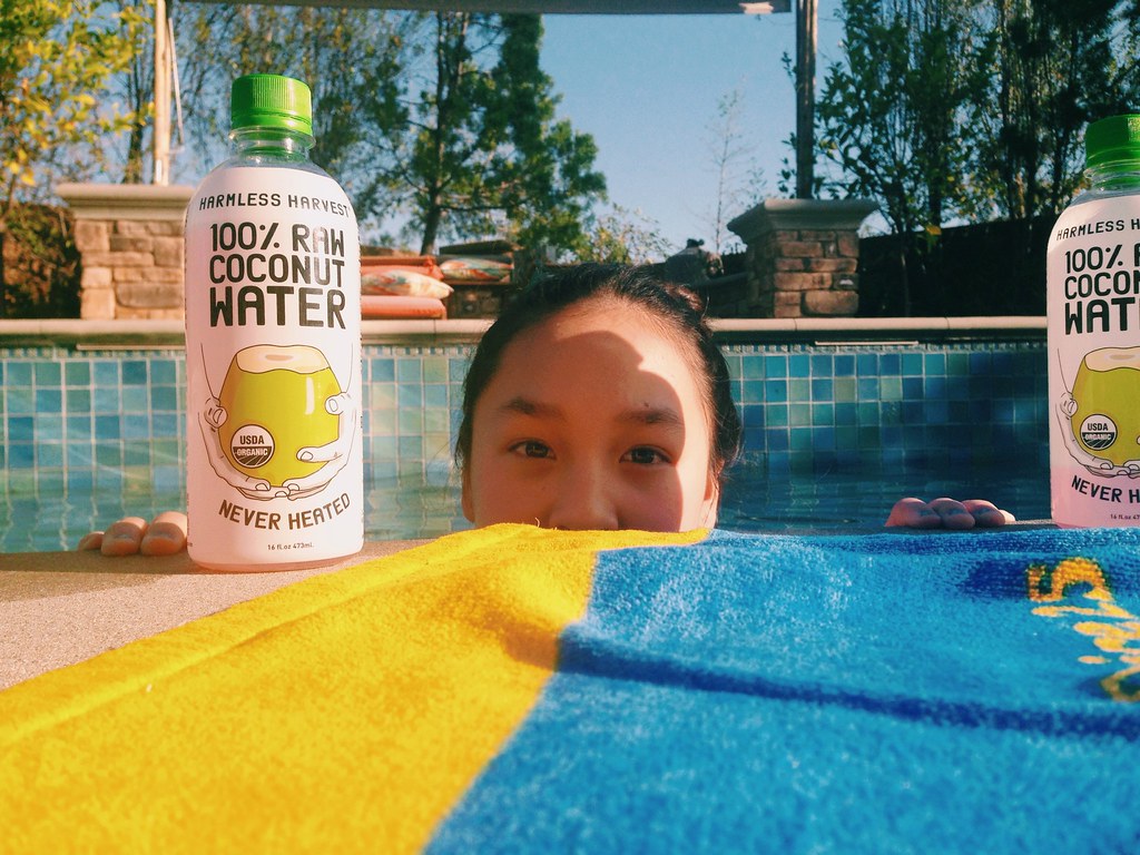 Isabel in the pool, coconut water