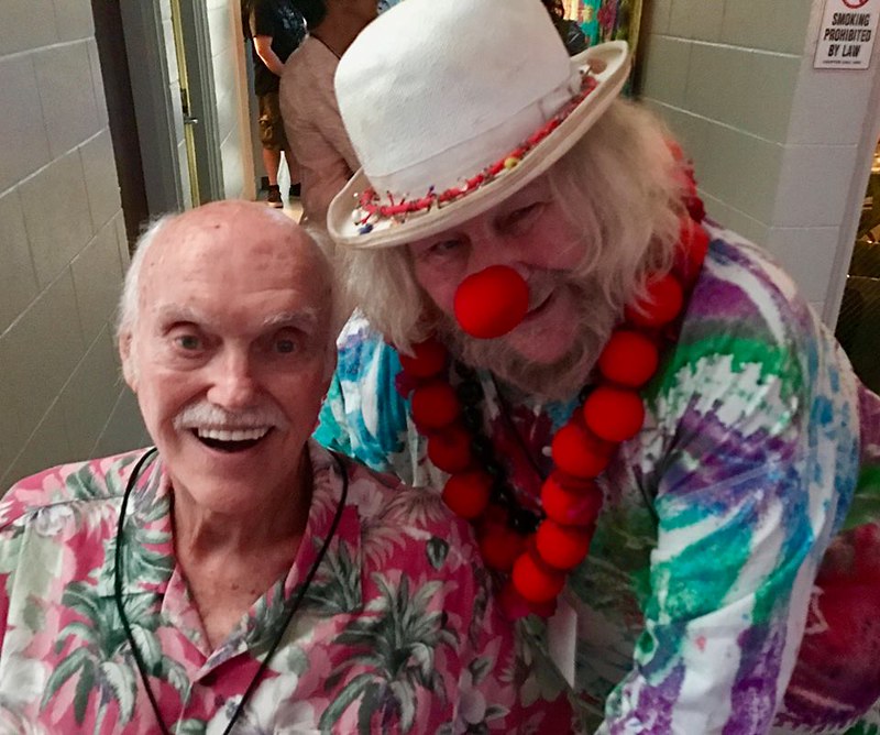 Seva co-founders Ram Dass and Wavy Gravy backstage at Sing Out For Sight.