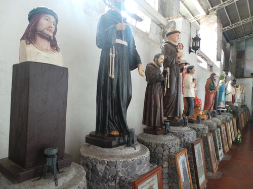 Statues of saints inside Daraga church