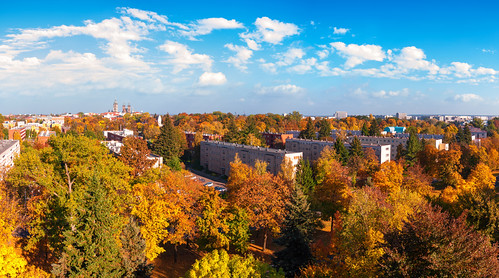 city autumn trees light sky urban panorama building nature colors skyline clouds landscape town europe day cityscape view flat cloudy czechrepublic partlycloudy hradeckralove pwfall