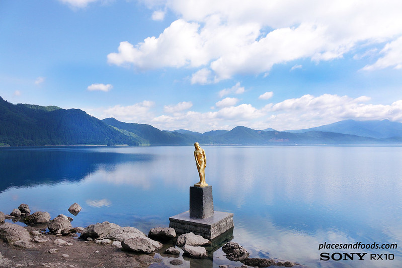 akita tazawa lake with tatsuko statue