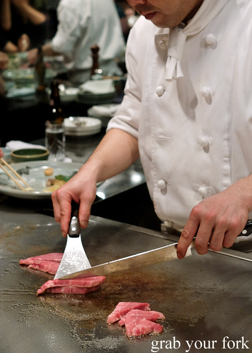 Searing the fatiest Kobe wagyu beef sirloin pieces at Wakkoqu, Kobe, Japan