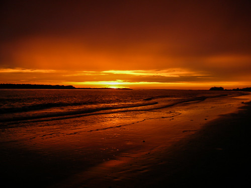 sunset orange beach waves bright dusk burnfing